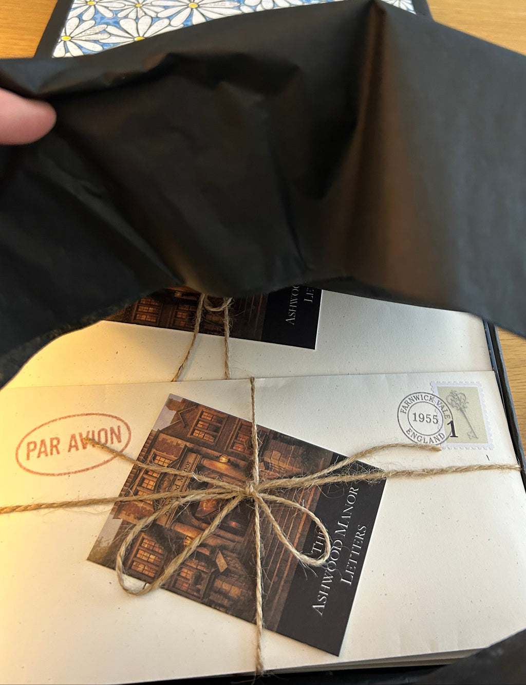 Tied with twine and marked by time, the Full Dossier is unveiled.