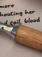 Soil and blood. A line that lingers, perhaps longer than it should...
